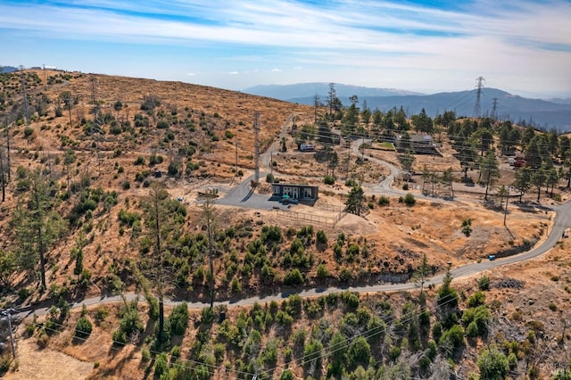 drone / aerial view featuring a mountain view