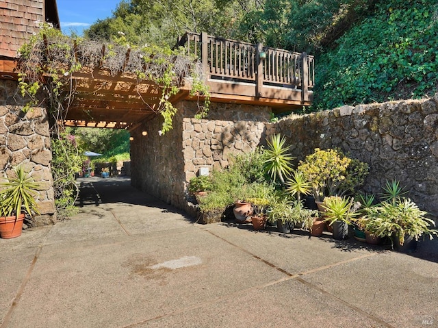 view of patio / terrace featuring a wooden deck