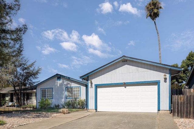 ranch-style home featuring a garage