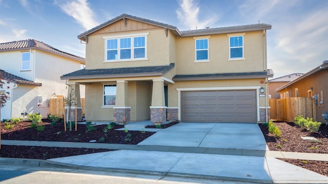 view of front of property featuring a garage