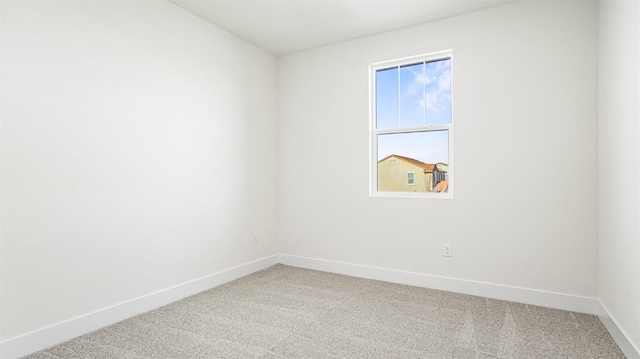 empty room featuring carpet floors