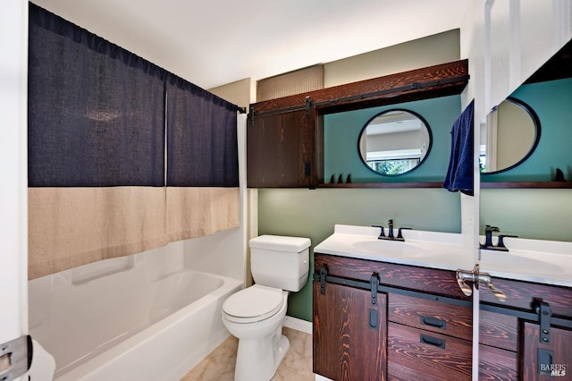 full bathroom featuring vanity, toilet, baseboards, and shower / washtub combination