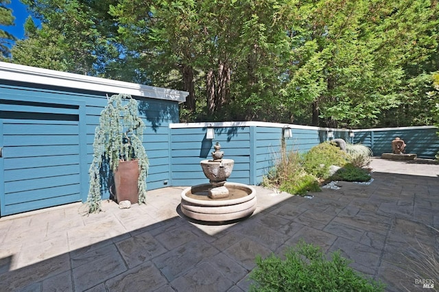 view of patio / terrace with fence