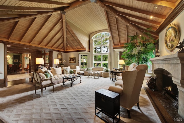 living room featuring wood ceiling, beamed ceiling, a premium fireplace, and high vaulted ceiling