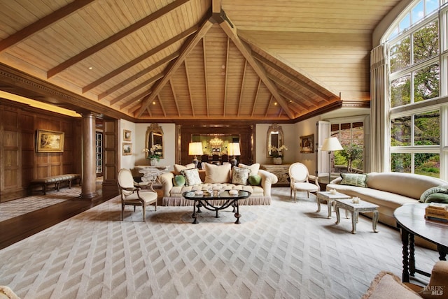 living room featuring beam ceiling, high vaulted ceiling, and wooden ceiling