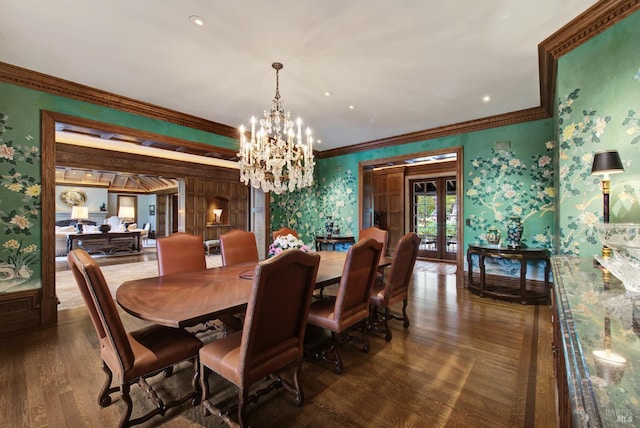 dining room with a notable chandelier, dark hardwood / wood-style floors, and crown molding