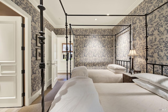 bedroom with wood-type flooring and crown molding