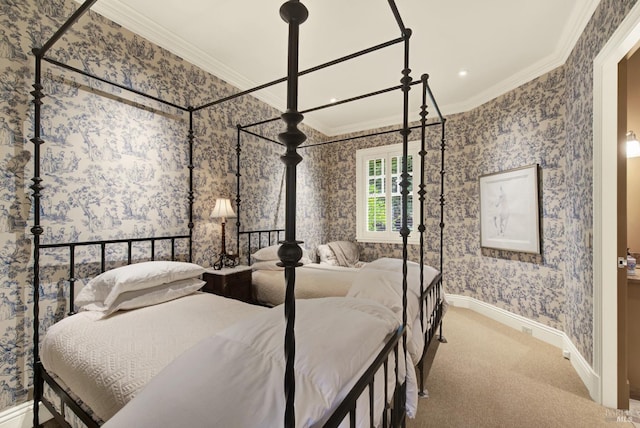 bedroom with carpet floors and crown molding