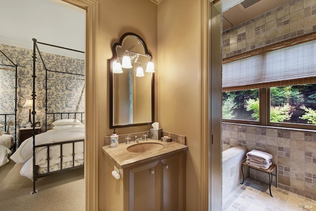 bathroom featuring vanity, tile walls, and ornamental molding