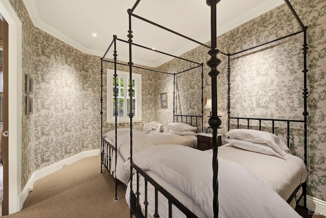 bedroom with carpet flooring and crown molding