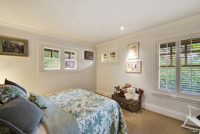 bedroom featuring ornamental molding and light colored carpet