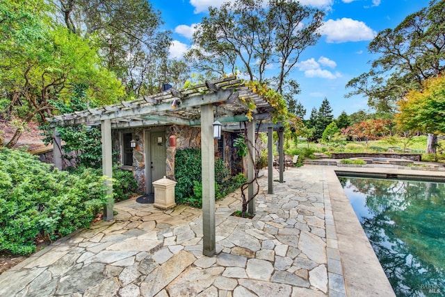 view of patio / terrace featuring a pergola