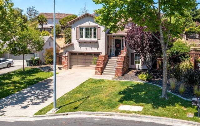 view of front of property featuring a garage and a front lawn