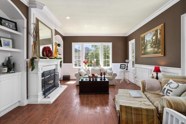 living room with ornamental molding and dark hardwood / wood-style flooring