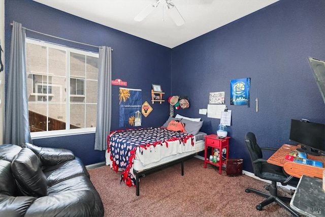 carpeted bedroom with ceiling fan