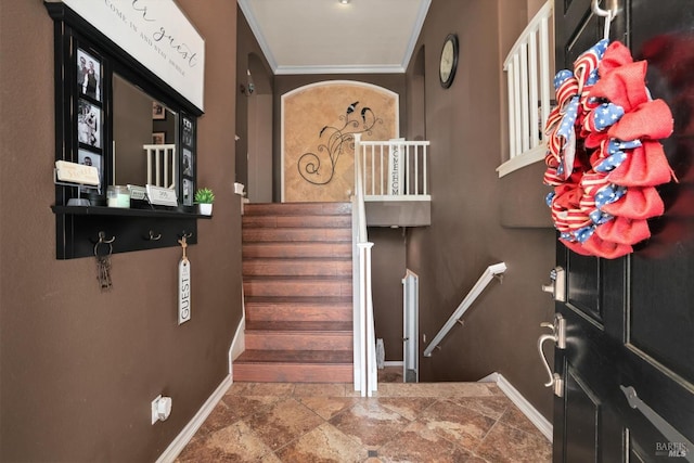 staircase with crown molding