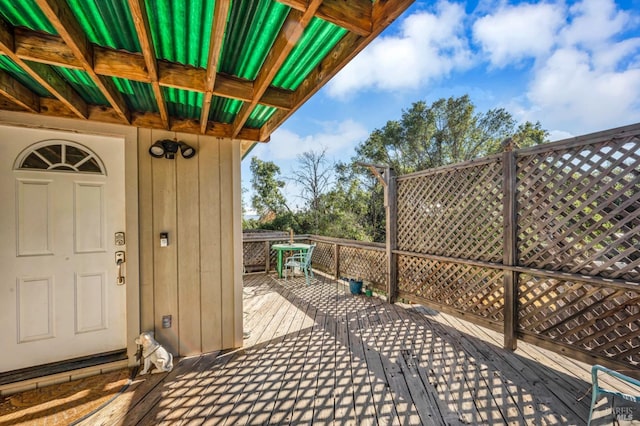 doorway to property featuring a deck