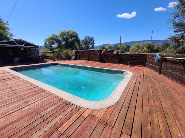 view of pool featuring a deck