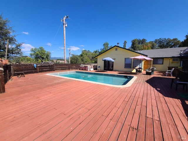 view of pool with a deck