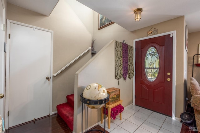 entrance foyer featuring light tile patterned floors