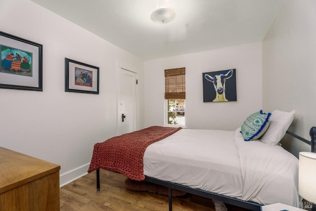 bedroom featuring light wood-type flooring