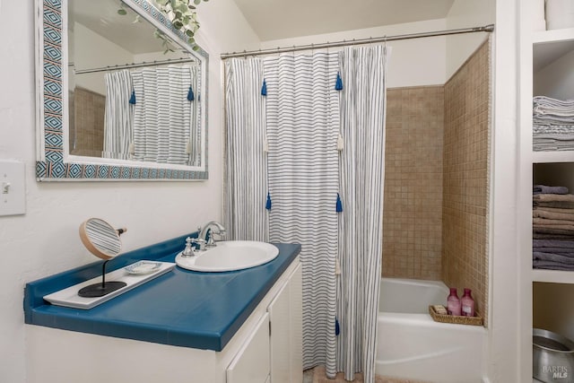 bathroom featuring vanity and shower / bath combo with shower curtain