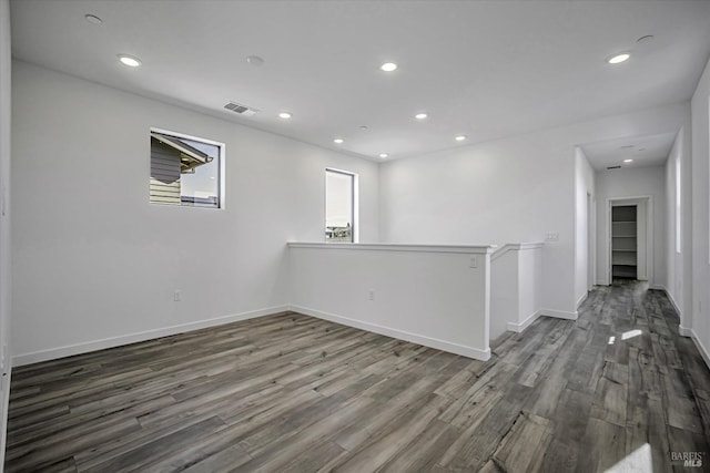 empty room featuring hardwood / wood-style floors