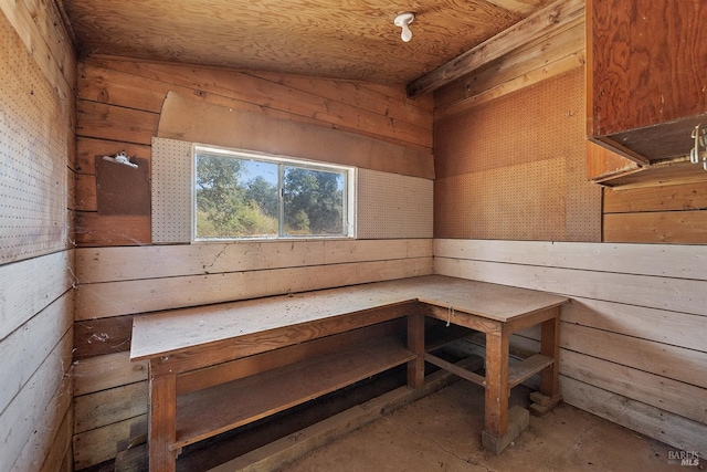 view of sauna / steam room with wood ceiling and wood walls