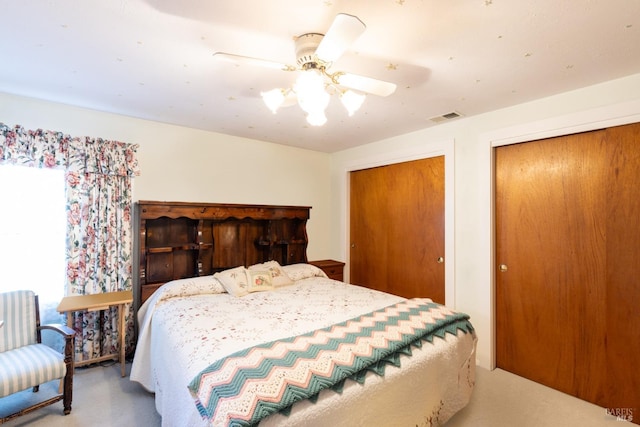 bedroom with ceiling fan and carpet flooring