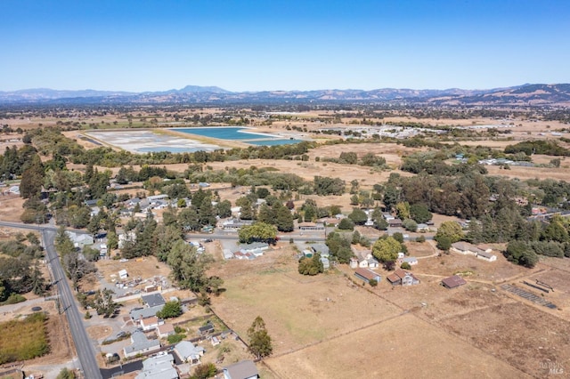 drone / aerial view featuring a mountain view