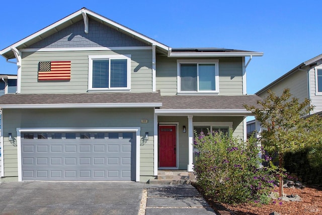 view of front of home with a garage