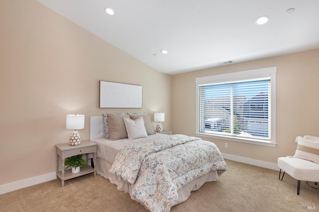 carpeted bedroom featuring vaulted ceiling