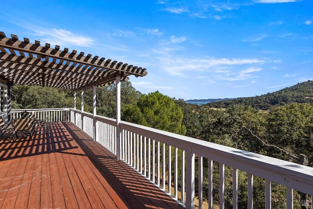 wooden deck featuring a pergola