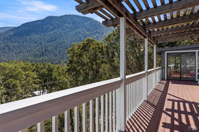 exterior space with a pergola and a mountain view