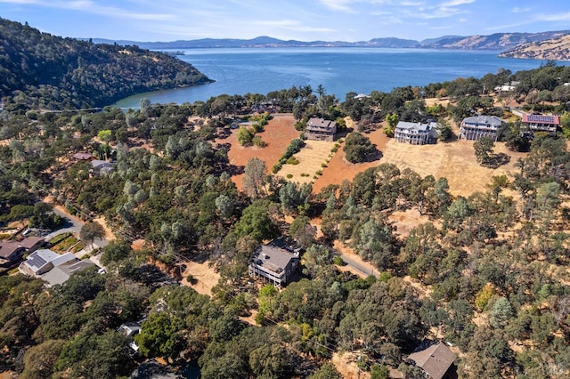 bird's eye view with a water and mountain view