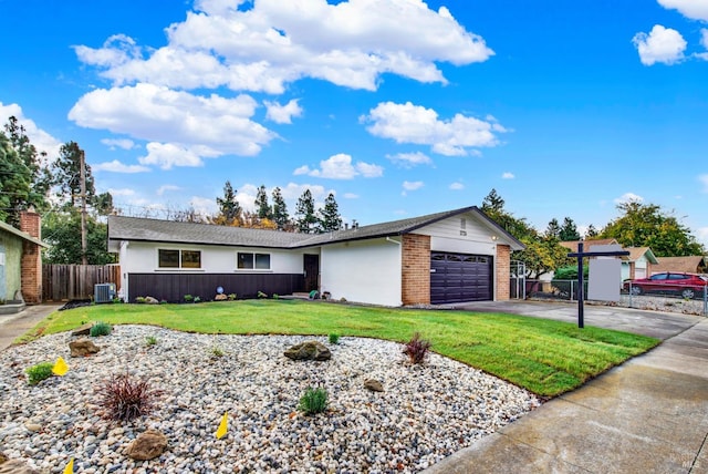 single story home featuring central AC, a front lawn, and a garage