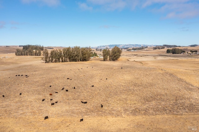 exterior space with a rural view