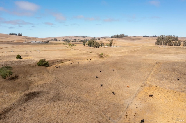 exterior space with a rural view