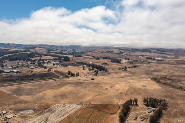 view of mountain feature with a rural view