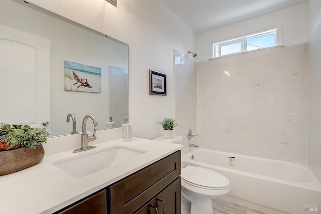 full bathroom featuring vanity, toilet, and bathtub / shower combination