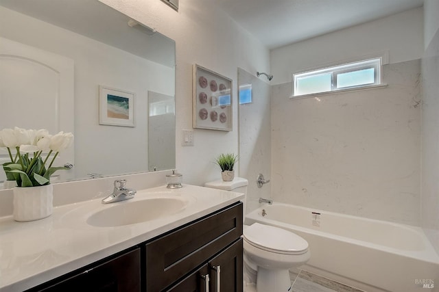 full bathroom featuring shower / bathtub combination, vanity, and toilet