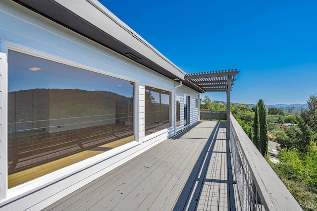 wooden deck with a pergola