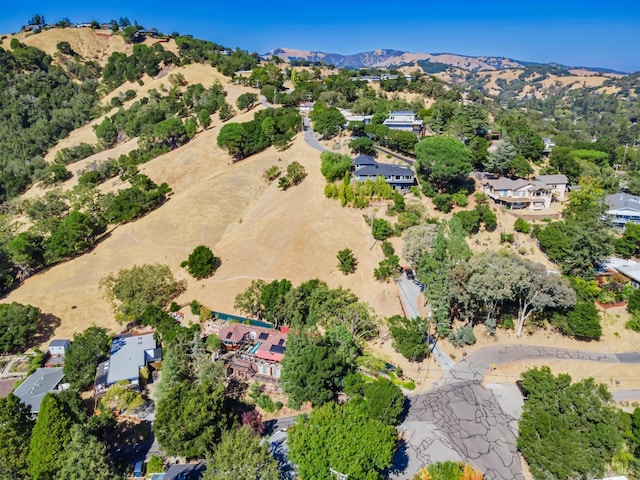 drone / aerial view featuring a mountain view
