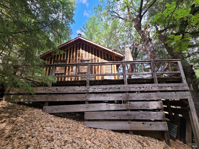 rear view of property with a deck