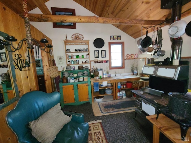 misc room featuring wooden ceiling, lofted ceiling with beams, and carpet floors