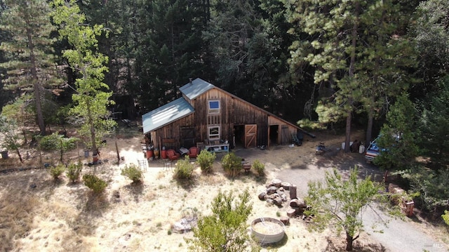 exterior space with an outbuilding