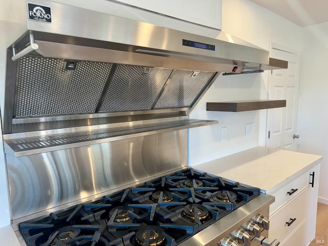 kitchen featuring white cabinets