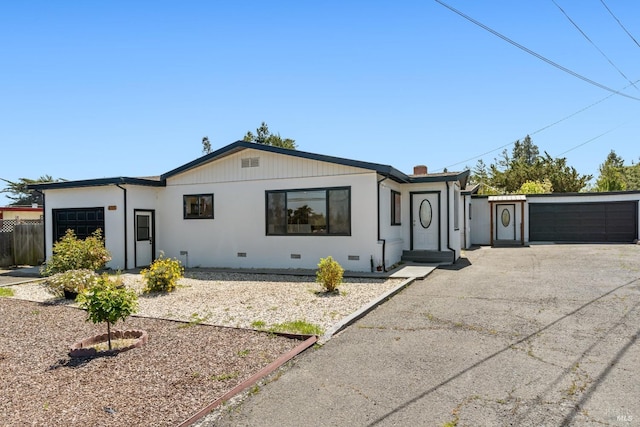 view of front of home with a garage