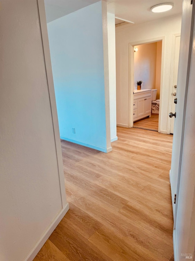 hallway featuring light hardwood / wood-style floors