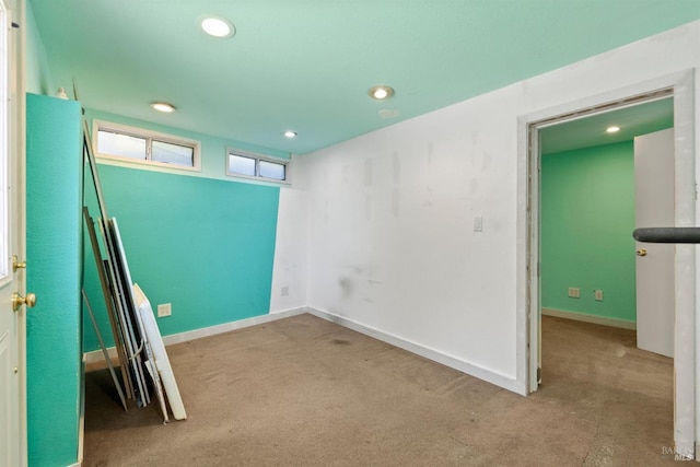 unfurnished bedroom featuring light carpet